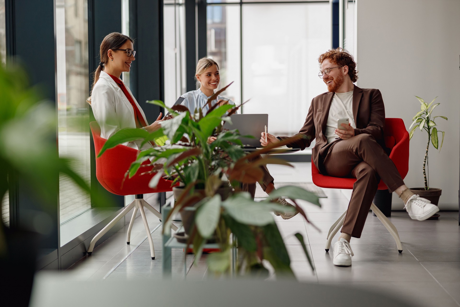 Engaging and Collaborative Business Meeting Taking Place in a Modern Office Setting